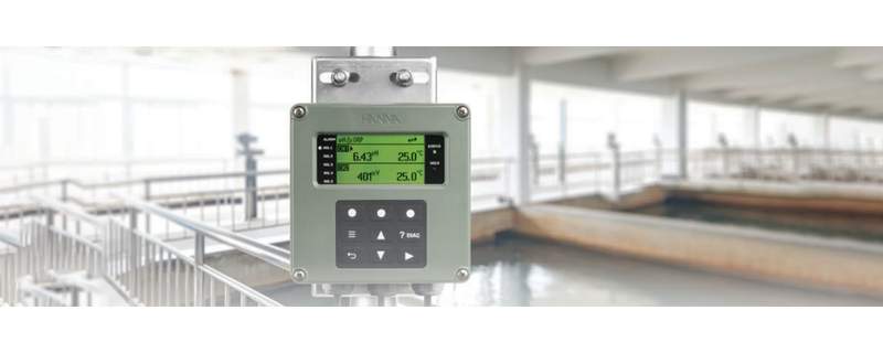 Hanna wall-mount pH and ORP monitor displaying live readings at a water treatment plant